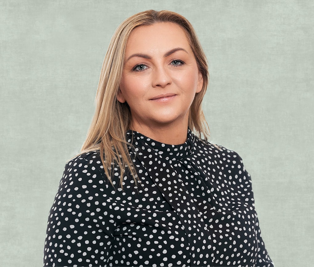 Headshot photo of Lana Kane, Director of Futurecare Homecare Support, on a green textured background